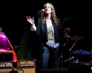 Patty Smith performing at Escape 2 New York